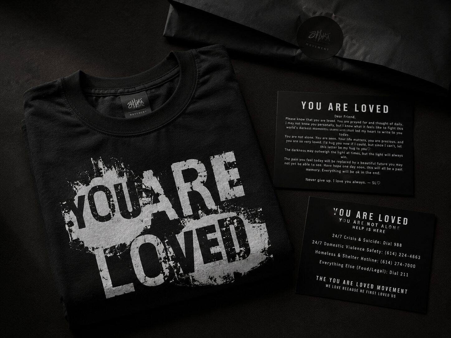 A tee with the letter and resource card